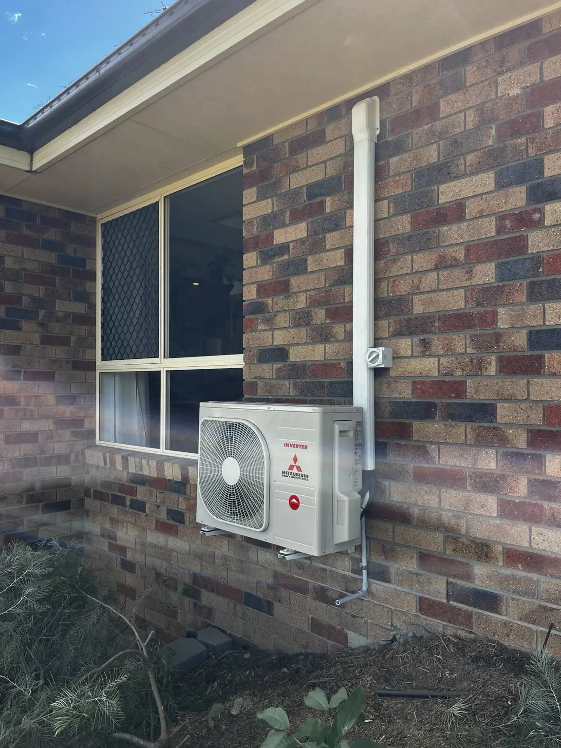 Completed residential split-system outdoor installation